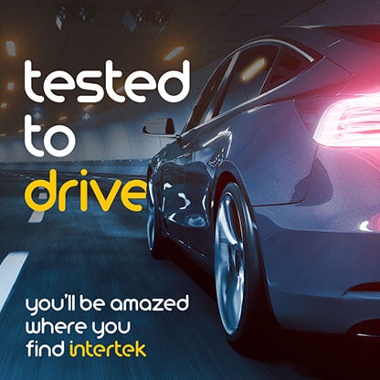 The rear quarters of a car on the road