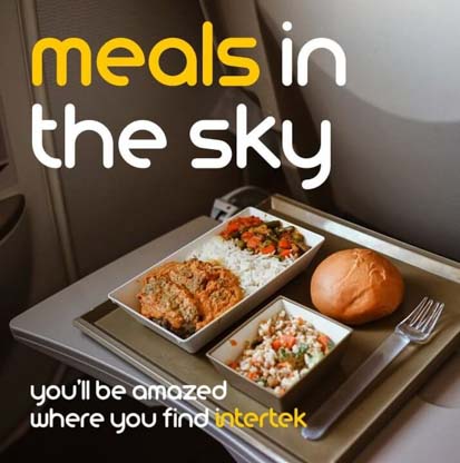A meal tray on a passenger plane